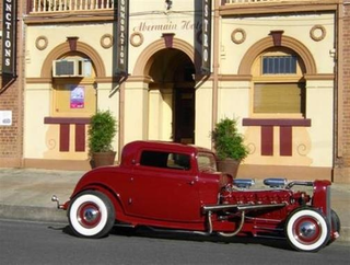 Illustration for article titled Aussie Nutjobs Drop GMC Twin-Six V12 In Fiberglass Hot Rod